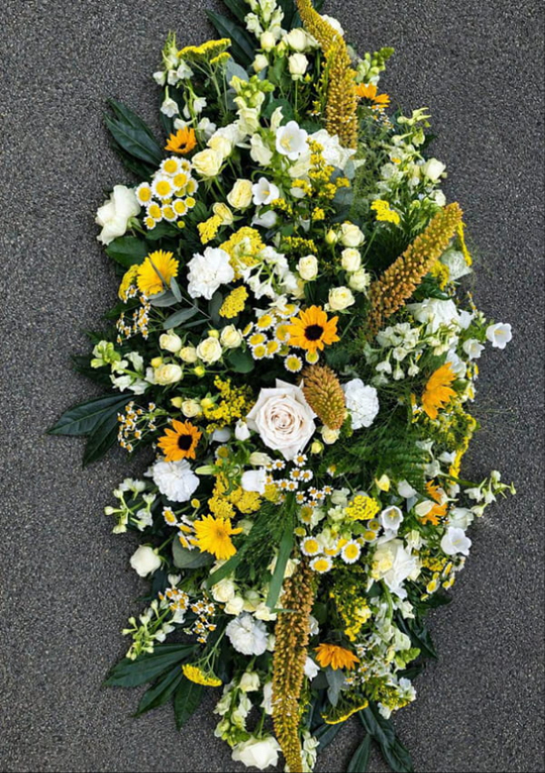 Funeral coffin spray created by Sarah's Flowers Cheshire