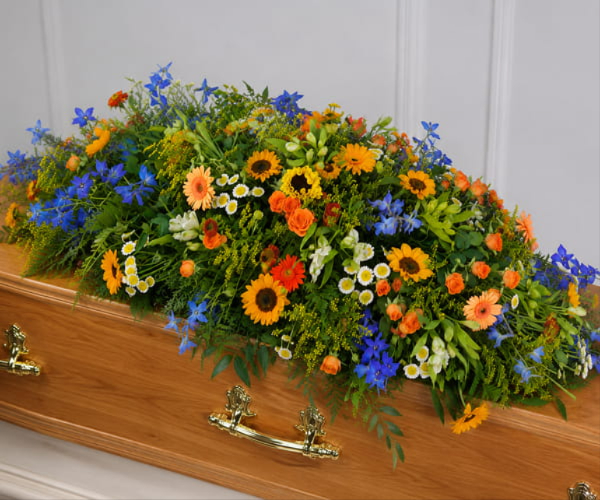 Coffin spray funeral flowers by a Congleton florist