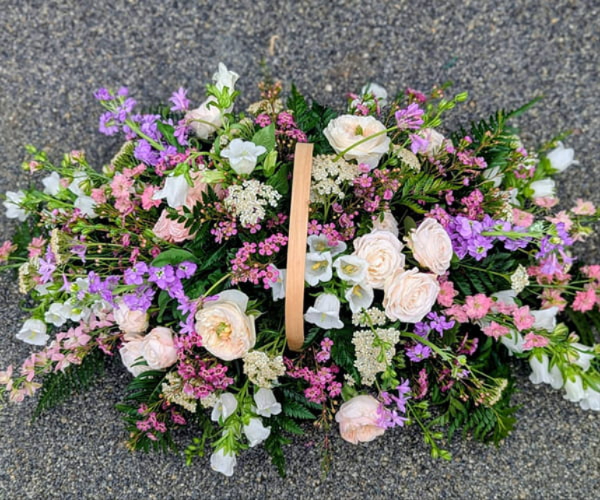 Sympathy flowers and baskets delivered in Cheshire
