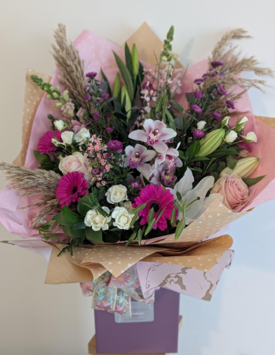 Grace & Bloom Bouquet - A stunning display of luxury and elegance, the Grace & Bloom Bouquet is a beautifully designed front-facing arrangement featuring a delicate orchid, elegant roses, premium choice flowers, and soft pampas grasses. Perfect for any special occasion or as a statement gift, this bouquet is handcrafted with care by Sarah’s Flowers Cheshire to bring beauty and sophistication to any space.