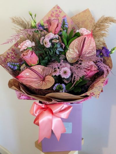 Pretty Exotic - A mix of pretty pink flowers with beautiful exotic anthuriums