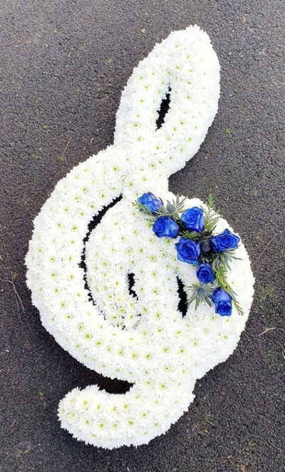 Treble Clef Tribute - Treble Clef tribute arranged using double chrysanthemums, finished with a coloured spray of your choice, please advise colour option in special requests box
