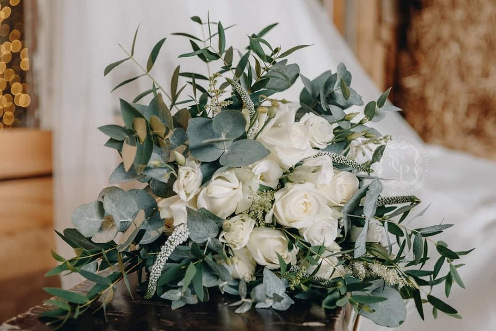Eucalyptus and White Roses Bridal Bouquet Product Image